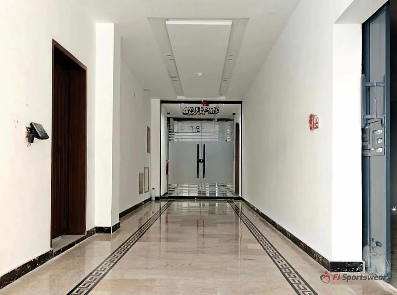 Entrance corridor of the FJ Sportswear factory in Sialkot, Pakistan