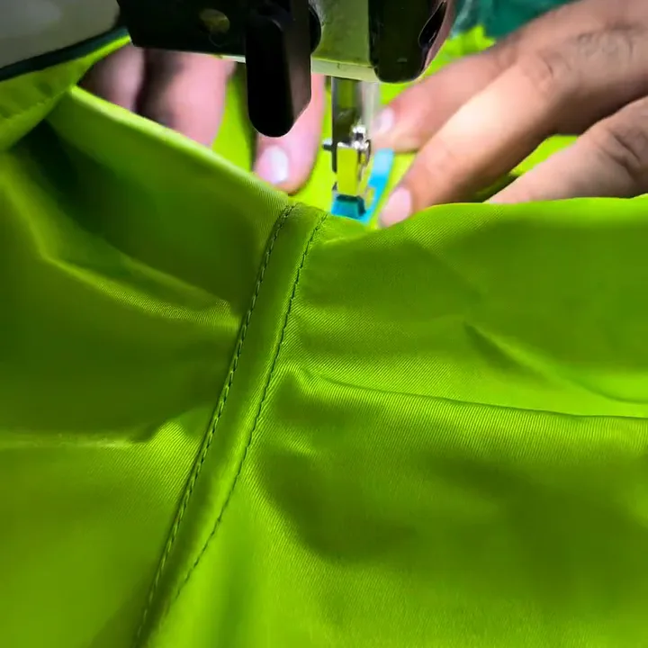 Custom Muay Thai shorts being stitched at the FJ Sportswear factory in Sialkot