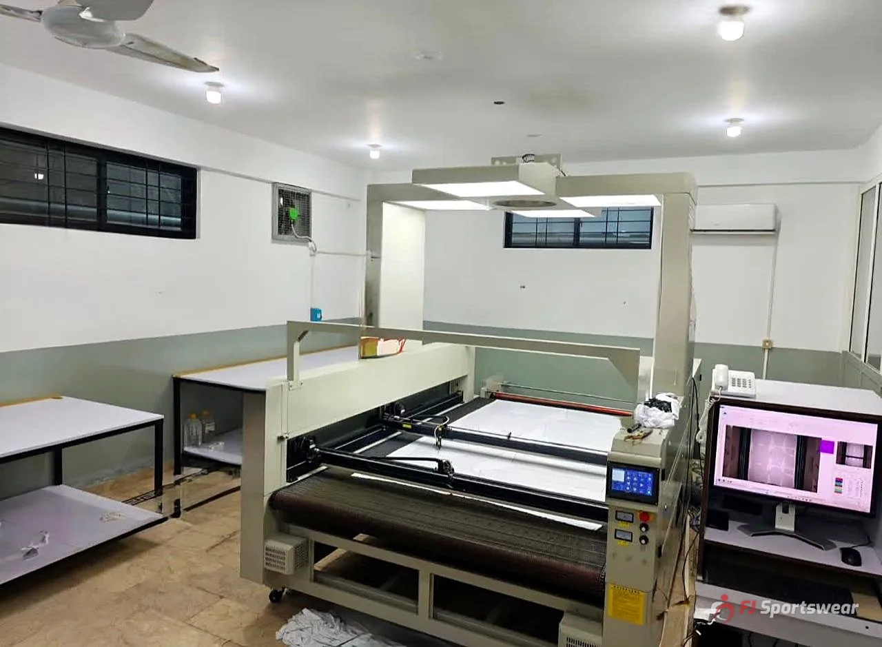 Sublimation heat transfer machine transferring printed designs onto sportswear fabric